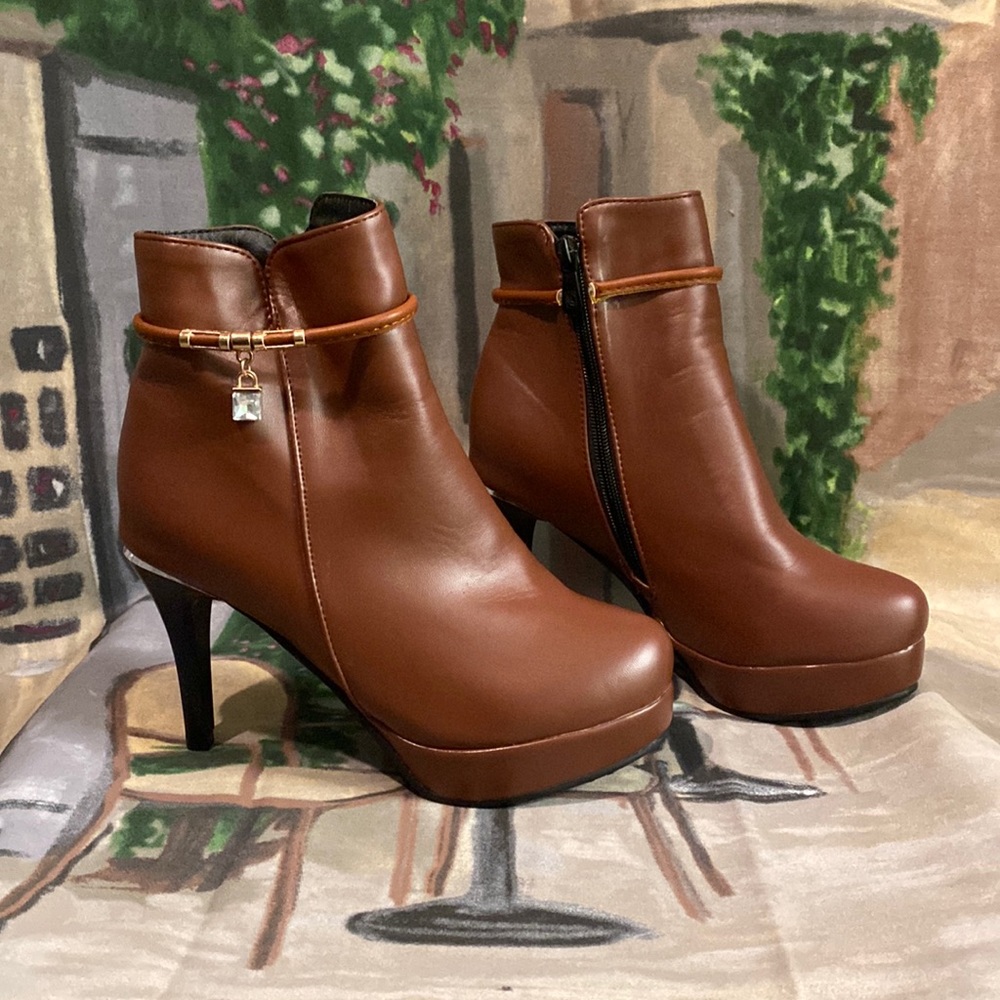 Brown booties with gem detail